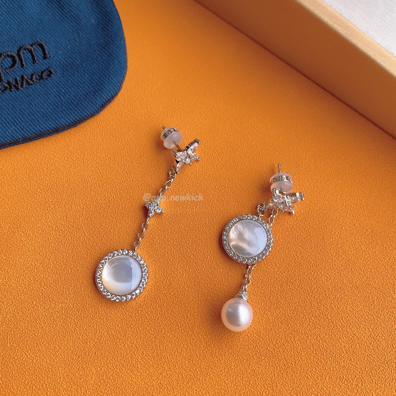 APM Monaco star mother of pearl earrings