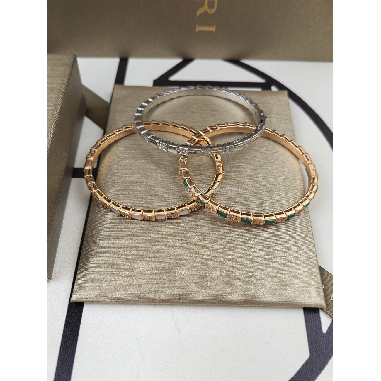 Bulgari Peacock Stone Snake Bone Bracelet